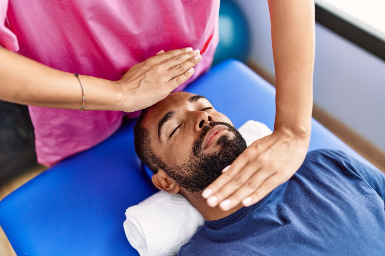 Photo of Reiki being administered