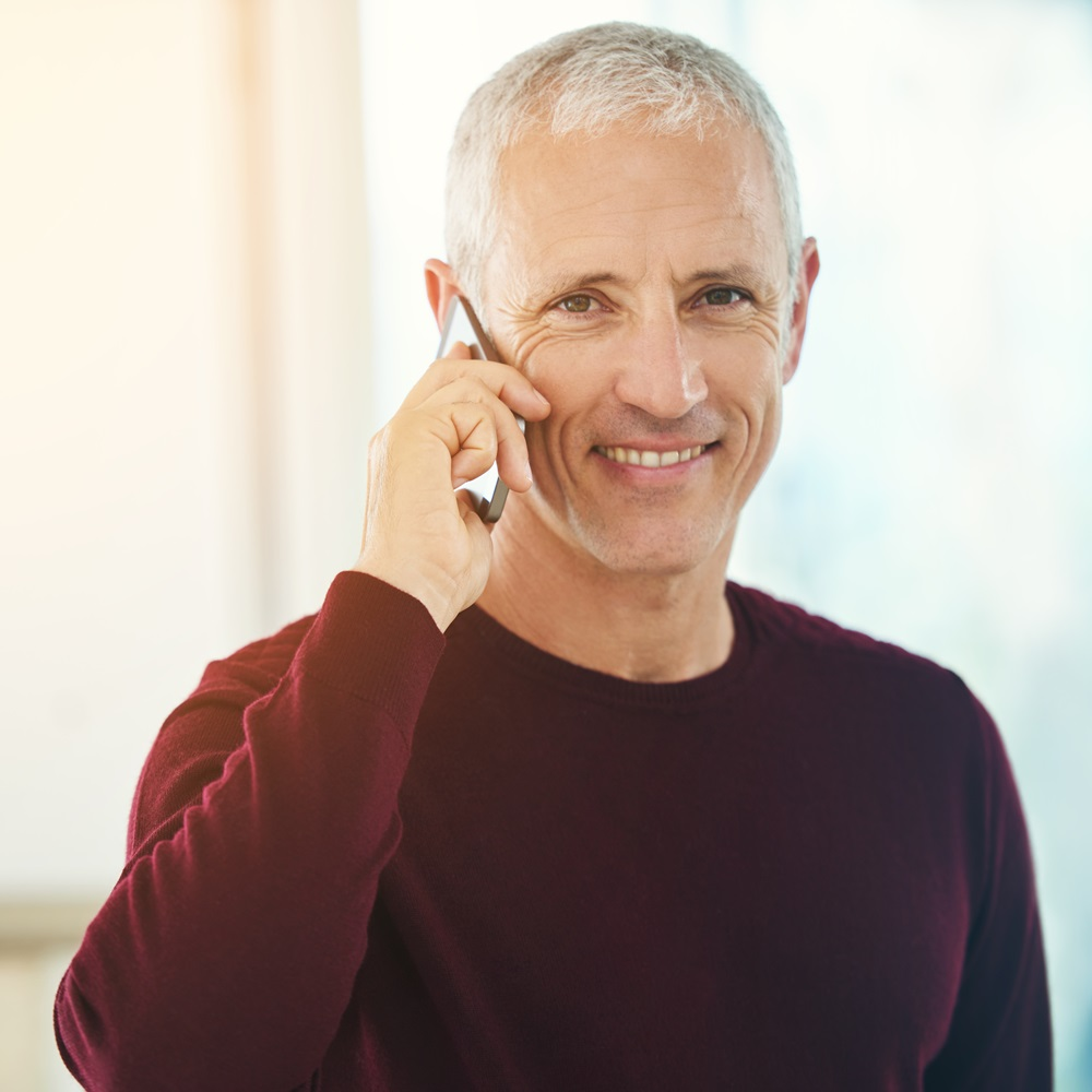 Man on phone talking.